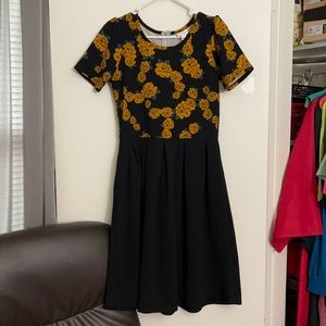 LuLaRoe Amelia Dress size medium. Black with flowers.